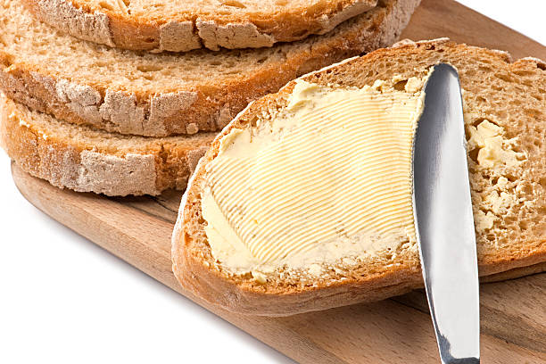 bread and butter  - butter margarine fat bread stock-fotos und bilder