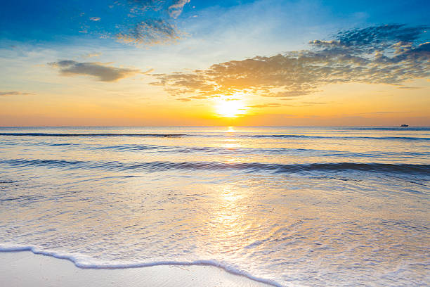 istock Bright sunrise over on the beach 622282762