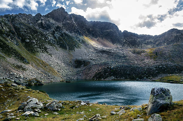 istock Mountain lake in a cloudy day 622285718