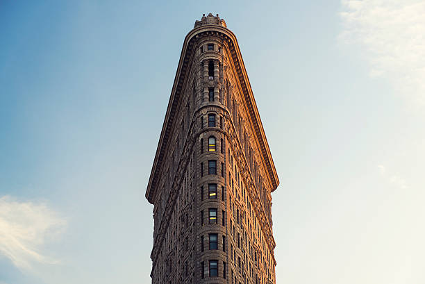 The Flatiron Building in New York City at Sunset stock photo