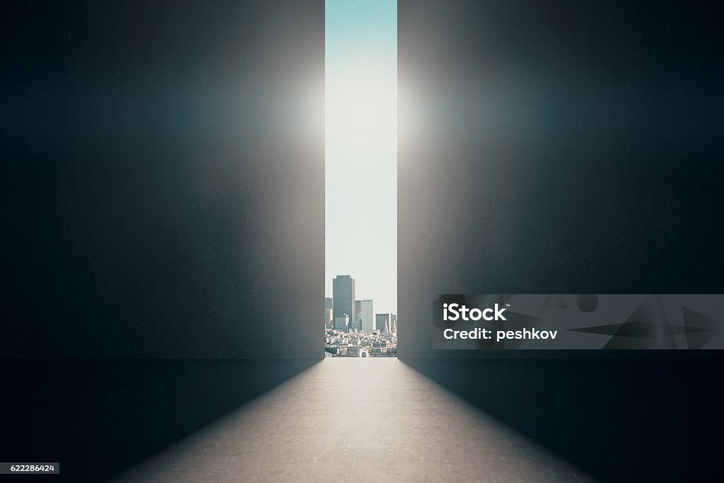 Abstract opening in wall Abstract opening in wall with bright daylight and city view in concrete interior. Success concept. 3D Rendering Door Stock Photo