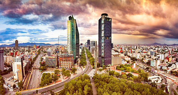 Aerial View of Mexico City skyline from Chapultepec Park Panoramic aerial view of Mexico City skyline at dusk. mexico city photos stock pictures, royalty-free photos & images