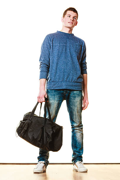 istock Young man casual style with bag isolated 622287766