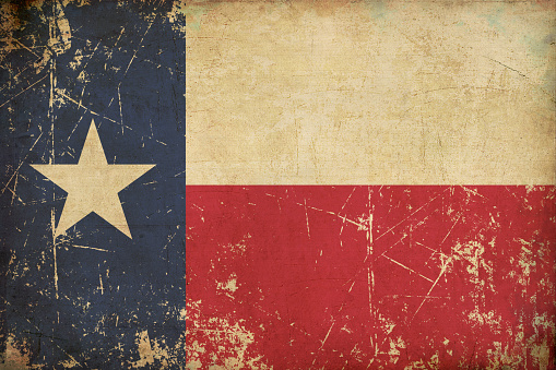 Grunge Illustration of a rusty, scratched, sepia, aged Texan flag.