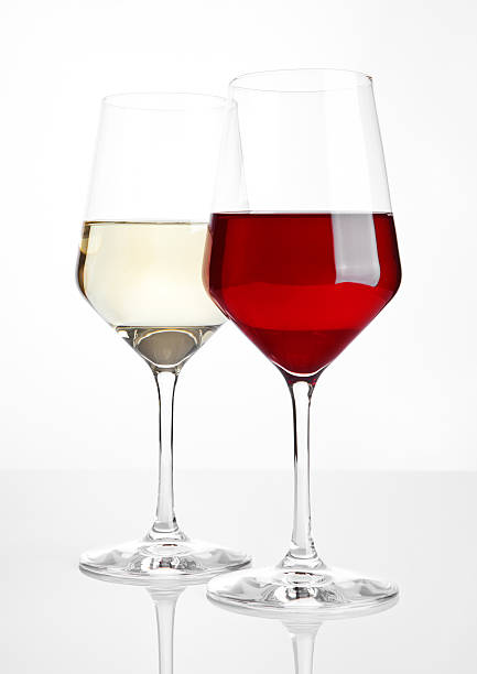 istock Glasses of red and white wine on white 622290178