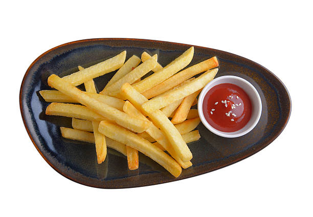 istock French fries with tomato sauce in caramic plate isolated 622290900