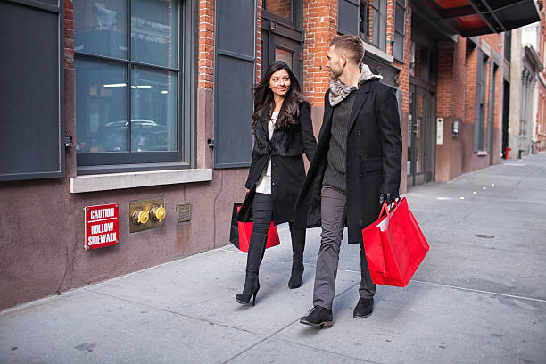 istock Shopping couple walking outdoors 622291108