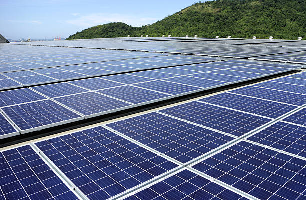 solar pv rooftop system mountain background - polycrystalline imagens e fotografias de stock