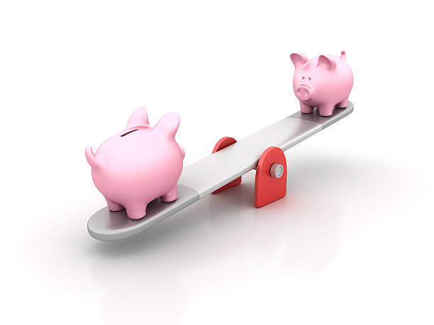 istock Seesaw with Piggy Bank - 3D Rendering 622292218