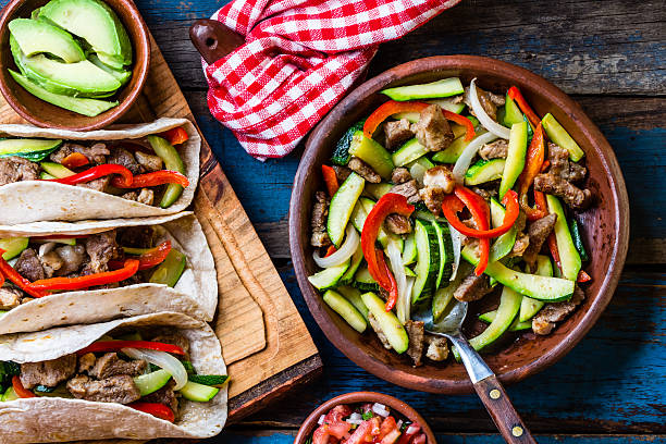 istock Mexican pork tacos with vegetables. Top view 622293058