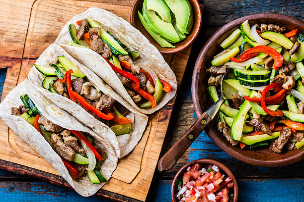 istock Mexican pork tacos with vegetables. Top view 622293384