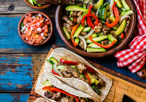 istock Mexican pork tacos with vegetables. Top view 622293566