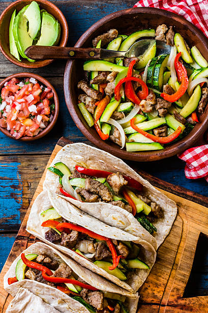istock Mexican pork tacos with vegetables. Top view 622293686