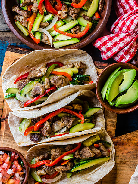 istock Mexican pork tacos with vegetables. Top view 622293794