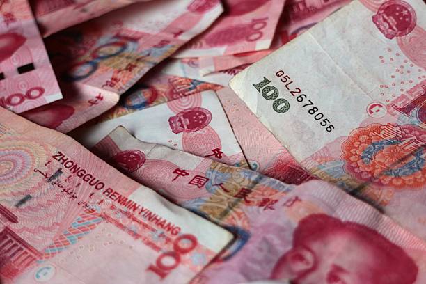 istock Pile of Overlapping 100 Yuan Banknotes Close Up 622297166