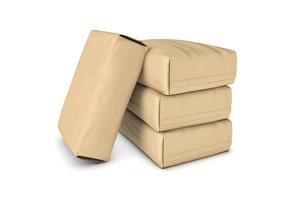 istock Rendering of four light beige cement sacks isolated on a 622297364