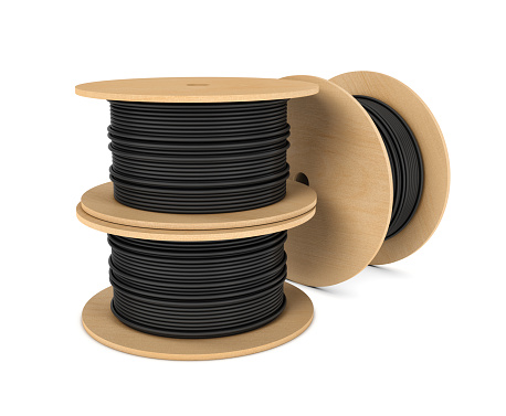 3d rendering of roll of black industrial underground cable on large wooden reel isolated on a white background. Four core al cable. Electrical cable. Professional construction site cable.