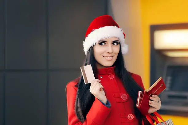 Photo of Happy Shopping Woman Holding Credit Card