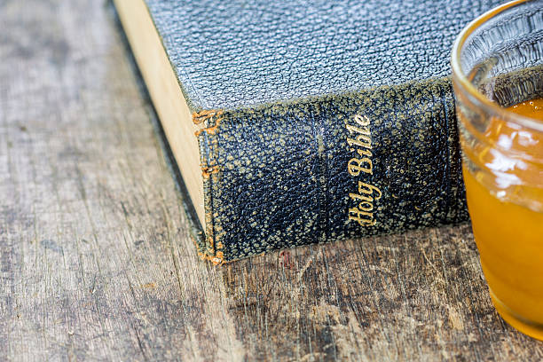 istock holy bible and a cup of honey 622299476