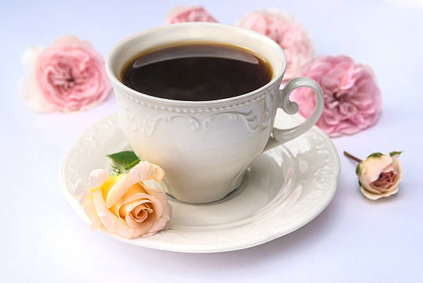 istock Tenderness. Black coffee and pink roses 622300748