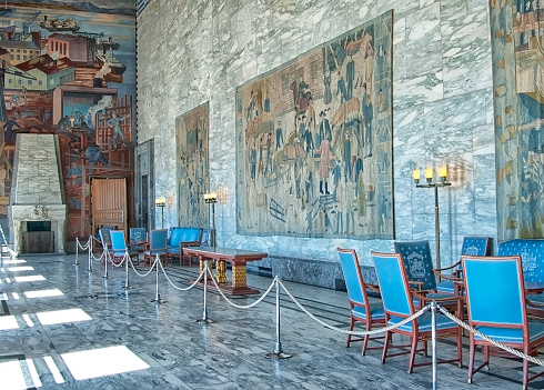 Oslo, Norway - April 12, 2010: The City Hall Building interior. Fragment of The Gallery of Celebration with fresco by Axel Revold, tapestry by painter Kare Jonsborg, weaver Else Halling.
