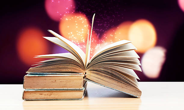 istock Abstract magic book on wooden background 622309856