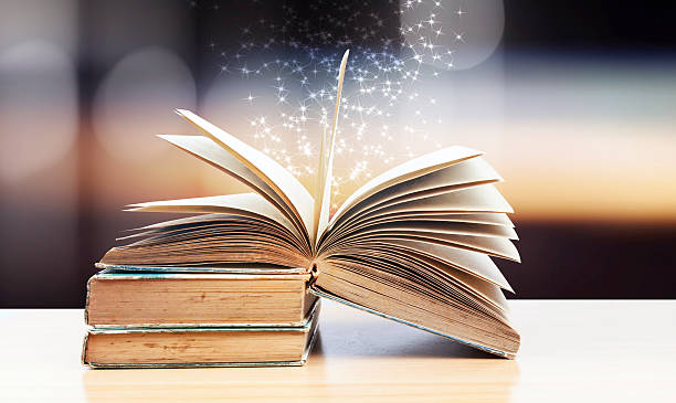 istock Abstract magic book on wooden background 622309894