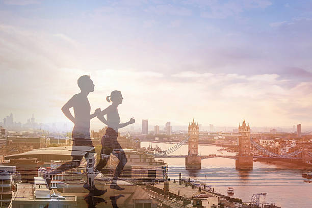 workout running double exposure - london england morning sunlight tower bridge imagens e fotografias de stock