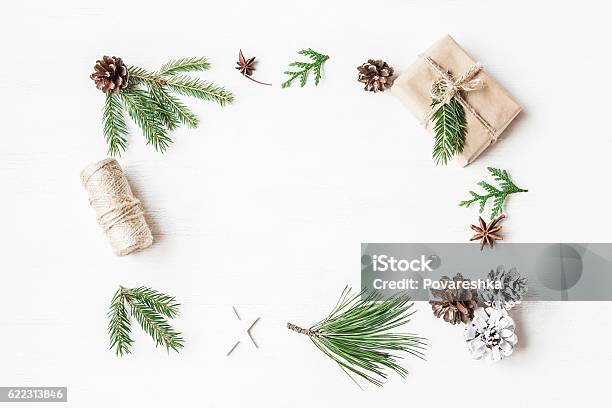 Christmas Gift Pine Cones Fir Branches Top View Flat Lay Stock Photo - Download Image Now