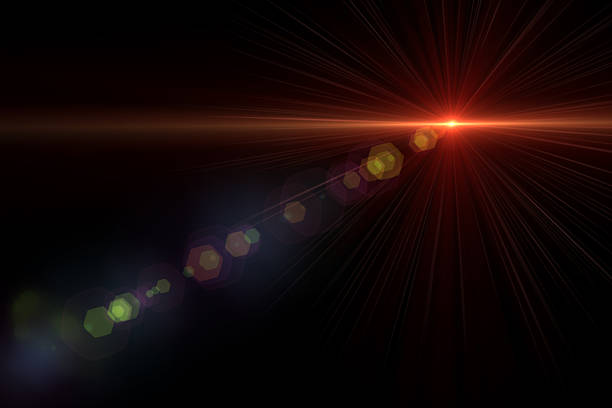 istock abstract lens flare yellow light over black background 622314076