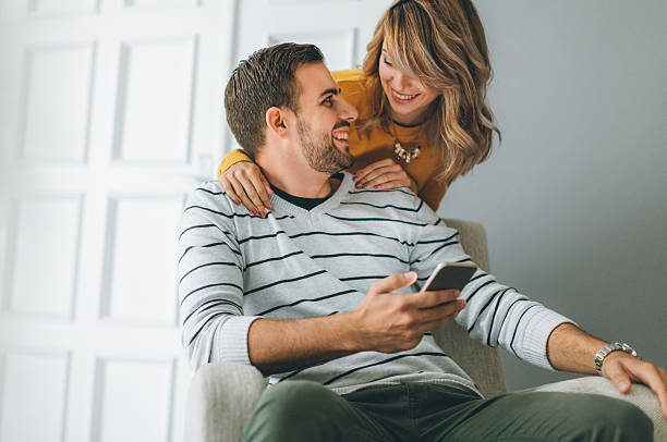 istock Beautiful young couple relaxing in free time 622314294