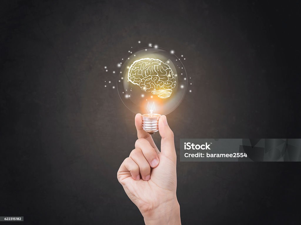lightbulb brainstorming creative idea abstract icon on business hand. Contemplation Stock Photo