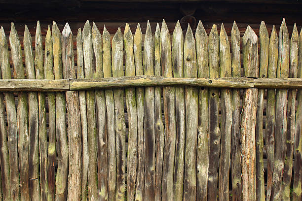 istock Old wooden palisade fence 622316256