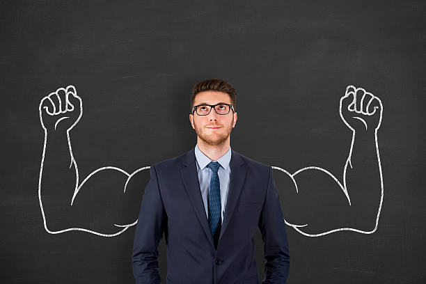 istock Successful business man on chalkboard background 622317932
