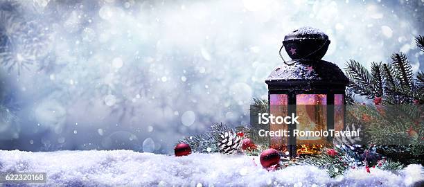 Lantern With Fir Branches On Snow Stock Photo - Download Image Now - Christmas, Lantern, Holiday - Event