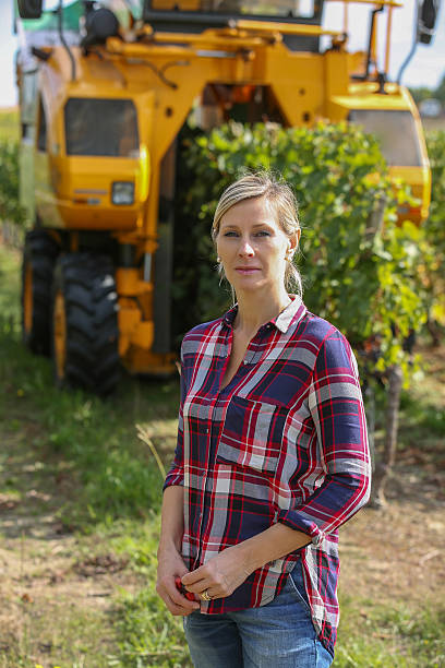 istock female wine grower and harvester 622320360