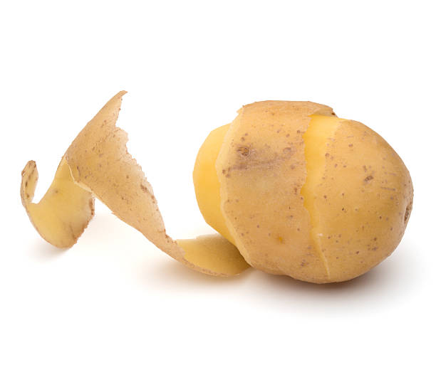 istock peeled potato tuber with peel spiral isolated 622320814