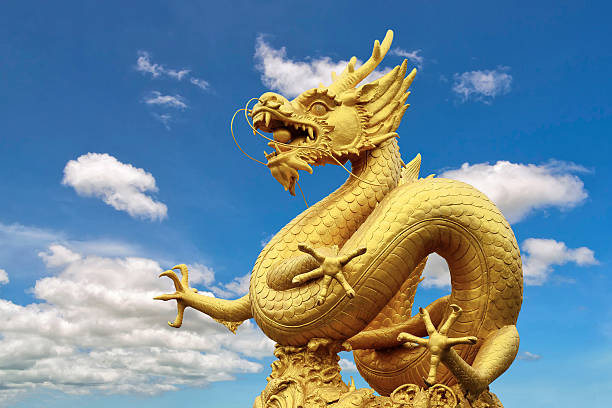 istock Dragon statue and natural blue sky background. 622418058