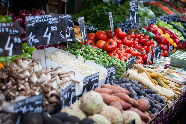 market stall with fresh vegetables in austria - vegetable market imagens e fotografias de stock