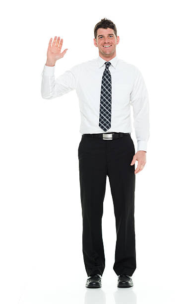 istock Smiling businessman waving hand 622420202