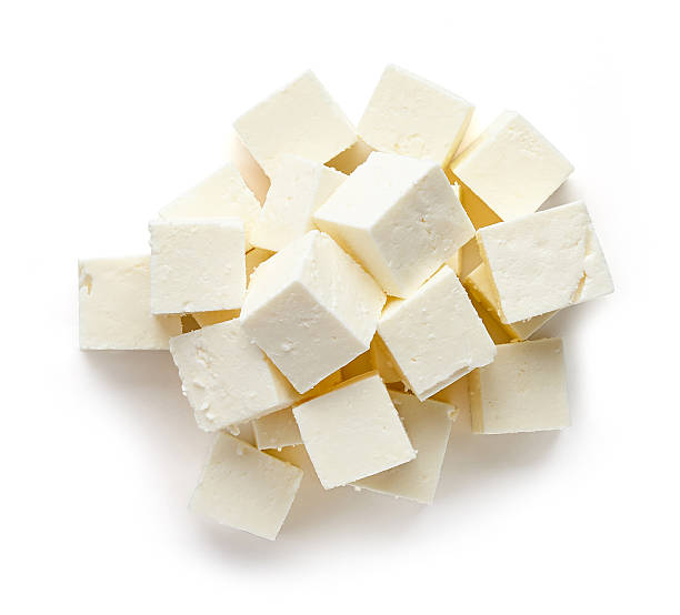 istock Heap of soft cheese squares from above 622420532