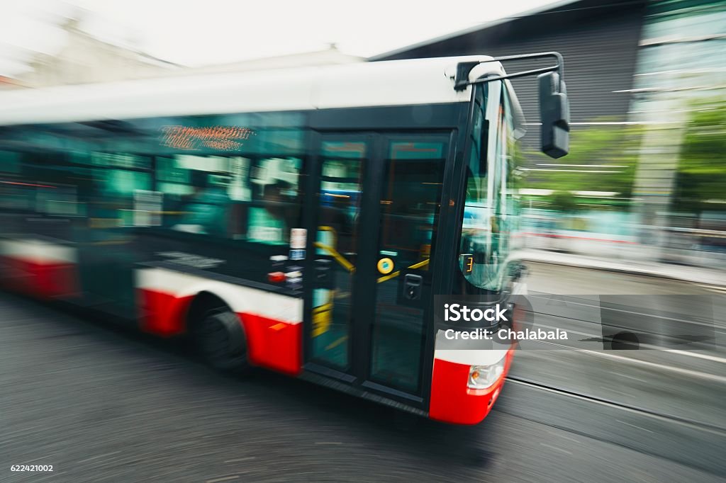 Public transportation Daily life in the city. Bus of the public transport on the street - blurred motion Bus Stock Photo
