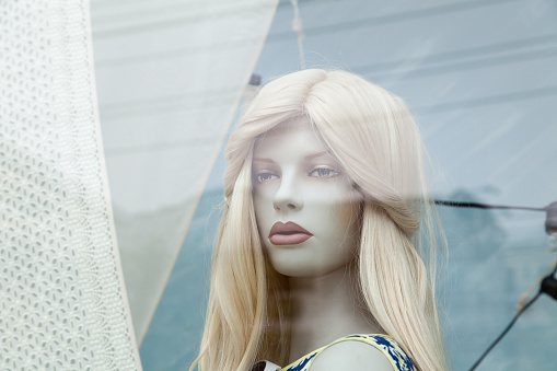 Pattaya, Thailand - March 28, 2016: Blonde woman mannequin head in a store window on Pattayasaisong Road