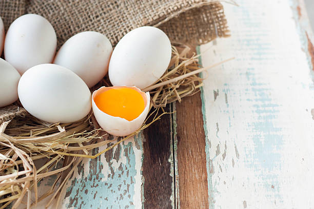 istock Organic white eggs on vintage wooden background. 622423742
