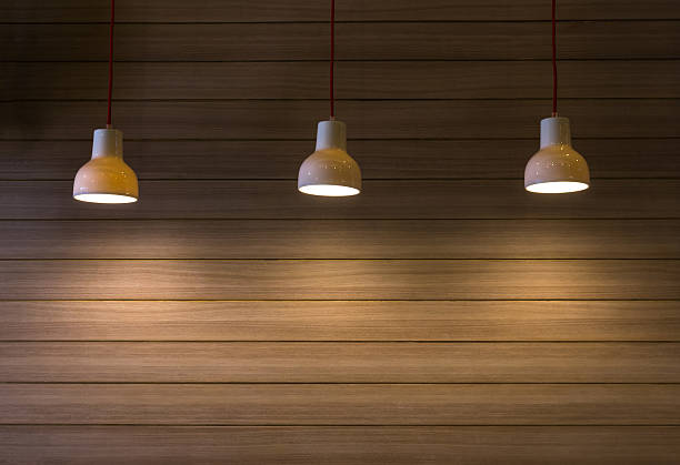 istock Lighting over the wood wall background 622424930