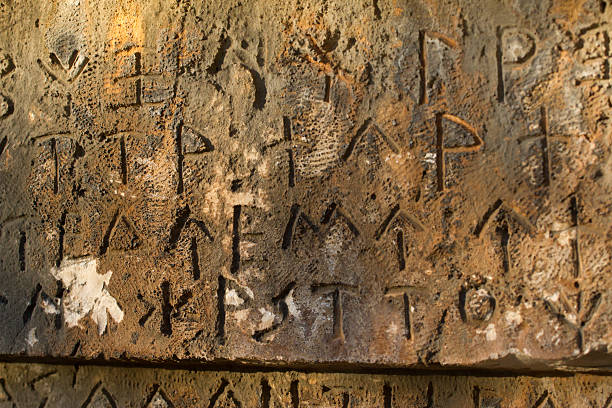 istock Inscription on old tomb in the Greek language. Characters, symbols 622425274