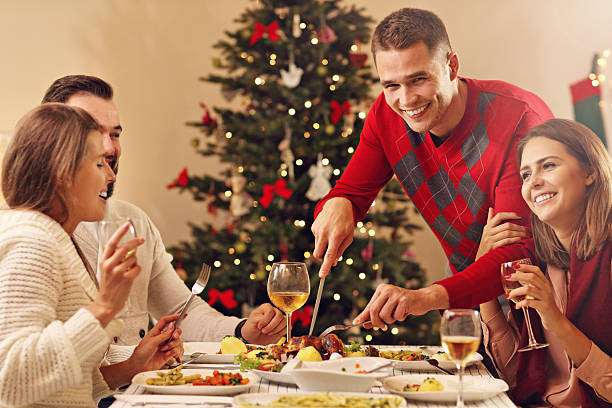 istock Group of friends celebrating Christmas 622425752