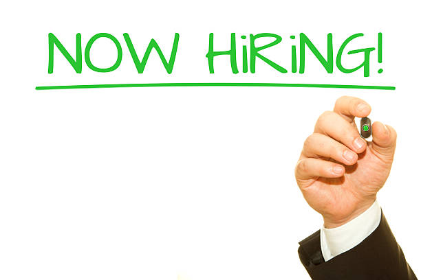 istock Businessman hand writing Now Hiring 622427094