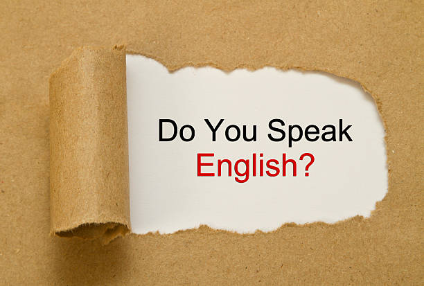 istock do you speak English question under torn paper 622427270