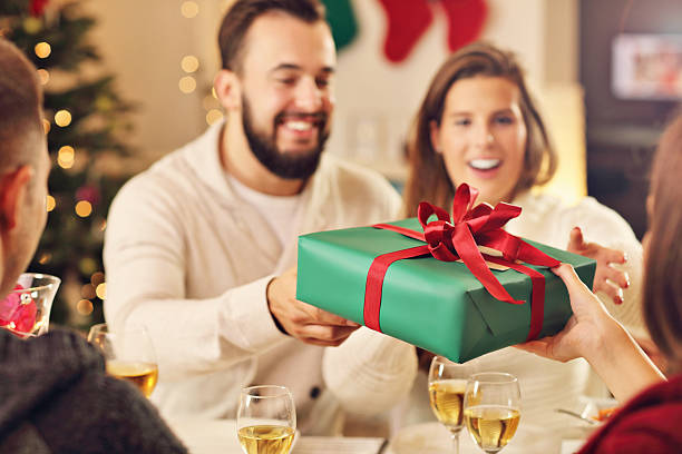 istock Group of friends celebrating Christmas 622428470
